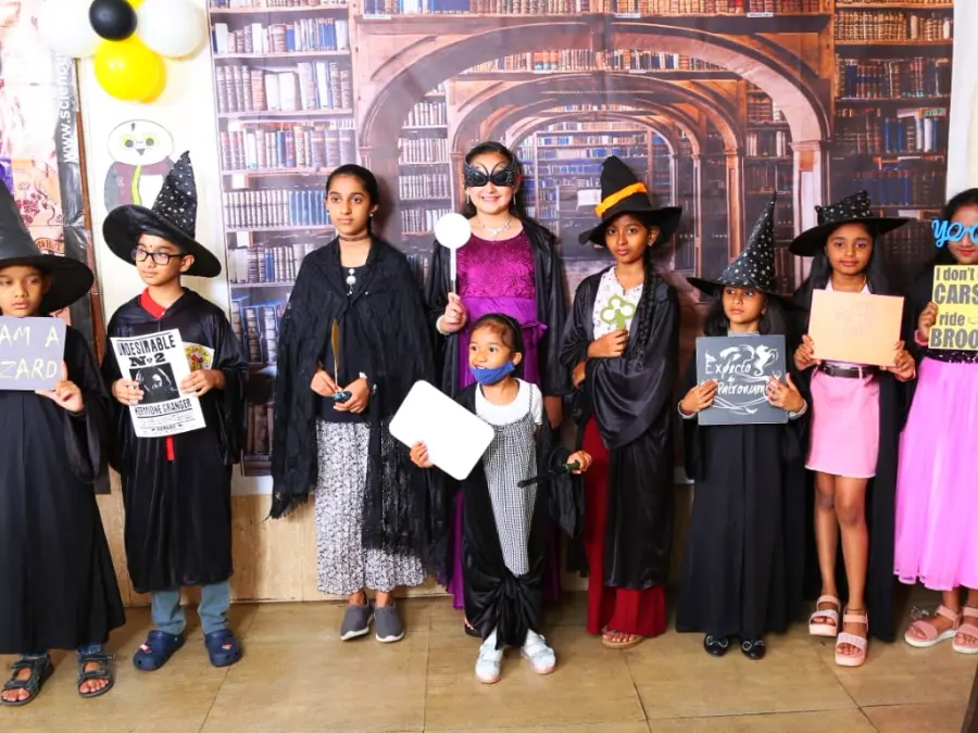 Children in wizard costumes at a MakerMasti Science of Wizards party
